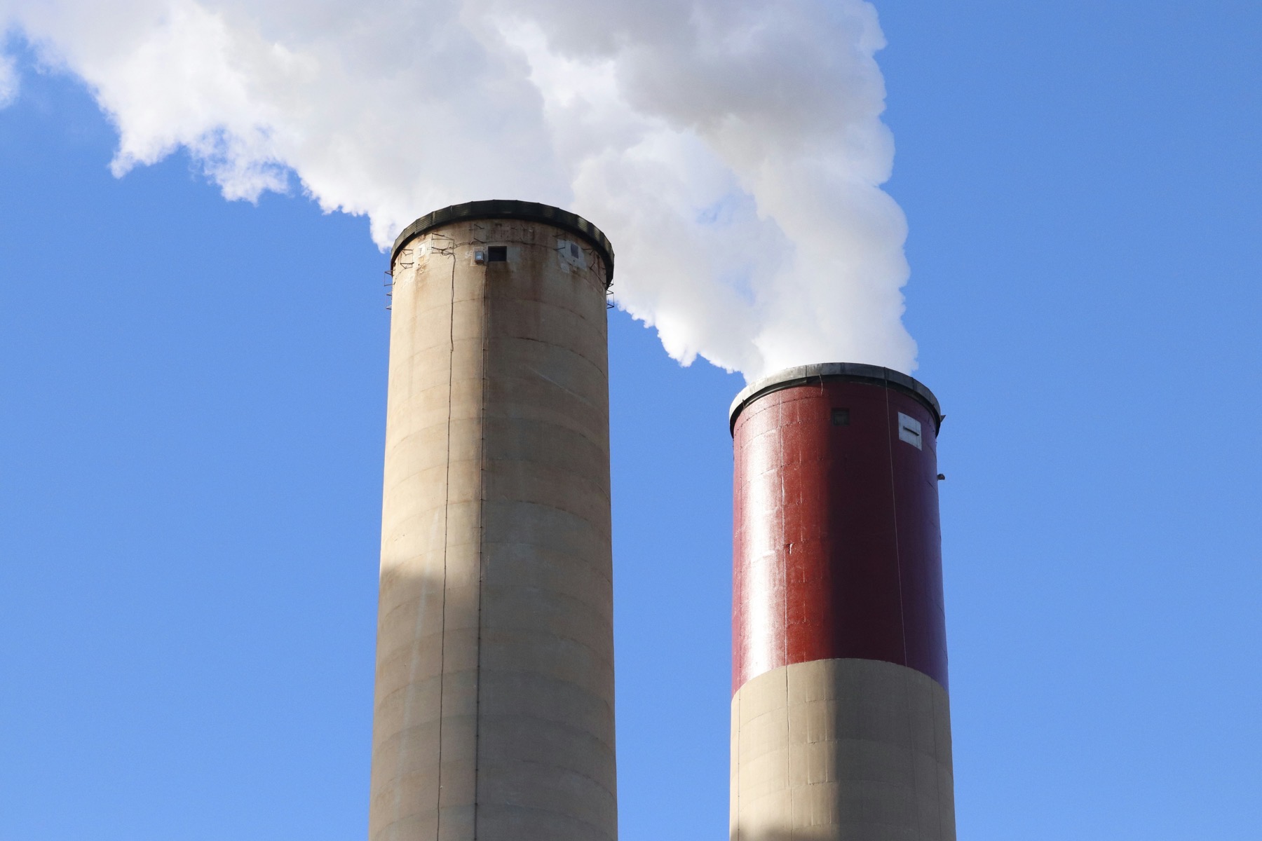 Smokestacks emitting exhaust