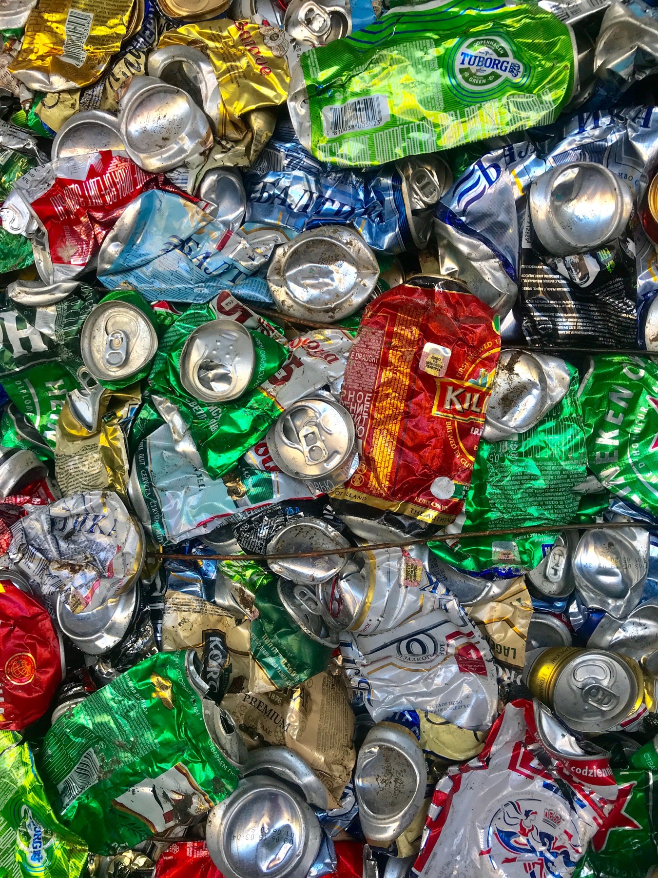 Overflowing recycling bin